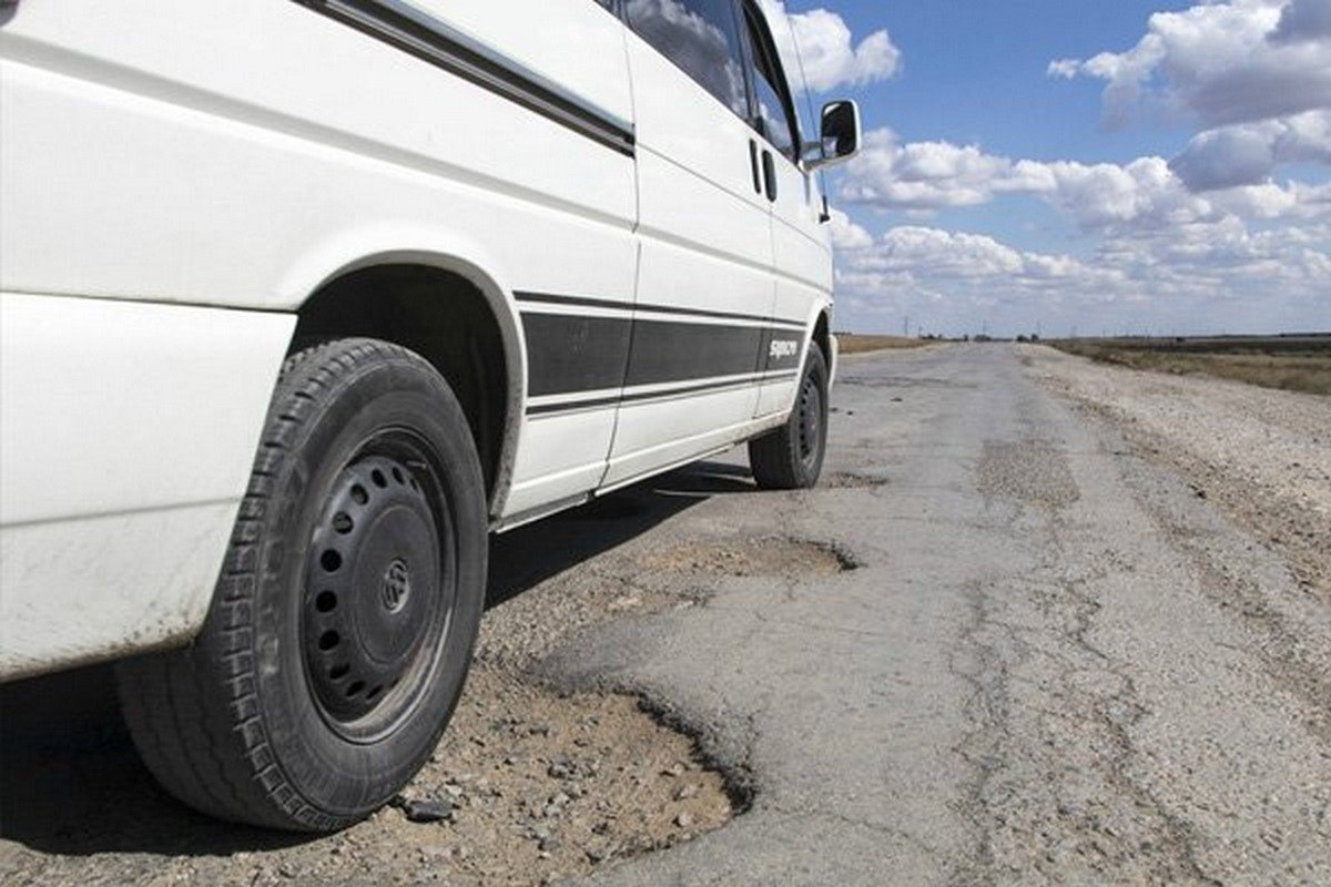 a car moves on a rough road