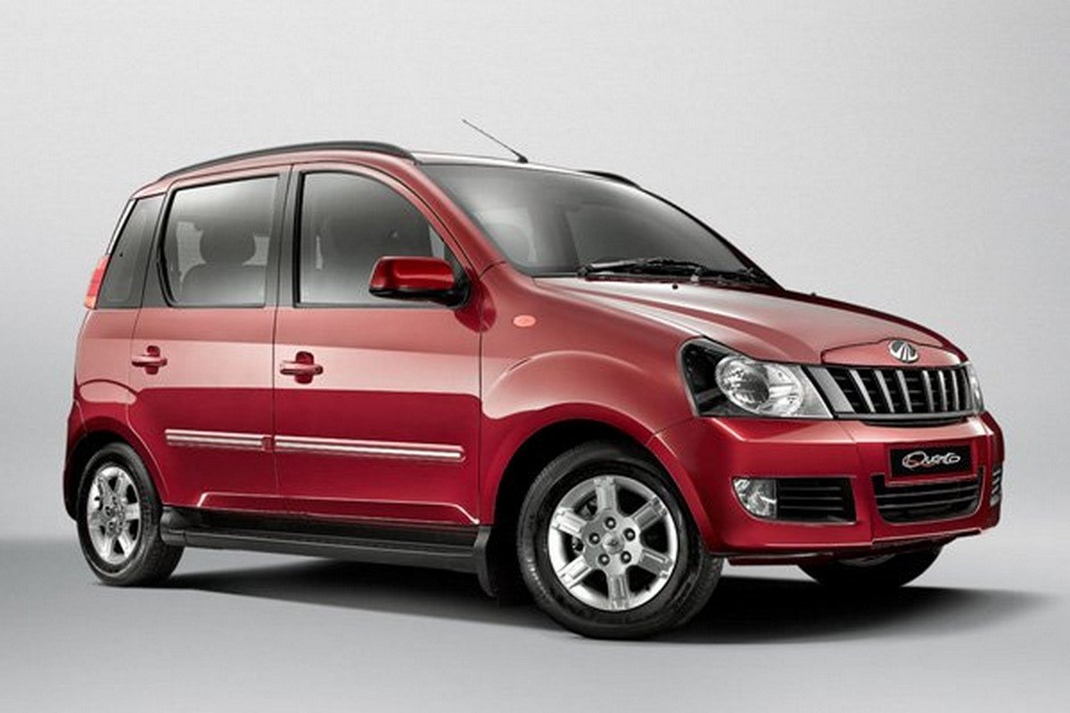 a red Mahindra Quanto