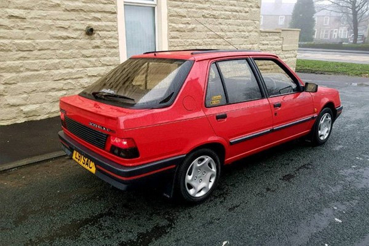a red peugeot 309