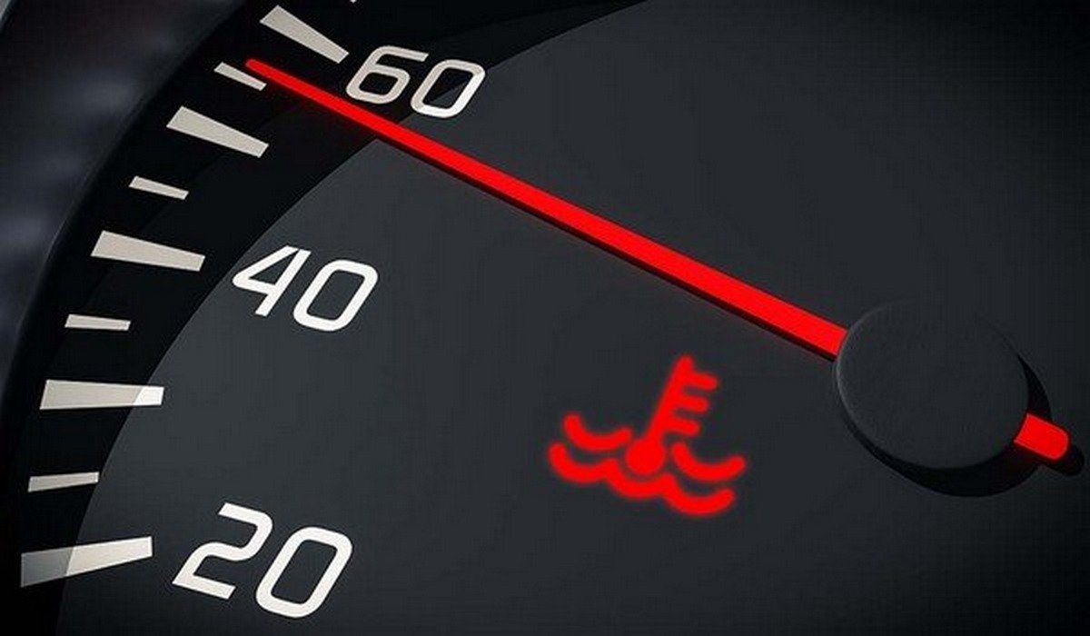  Red Engine temperature warning light on dashboard