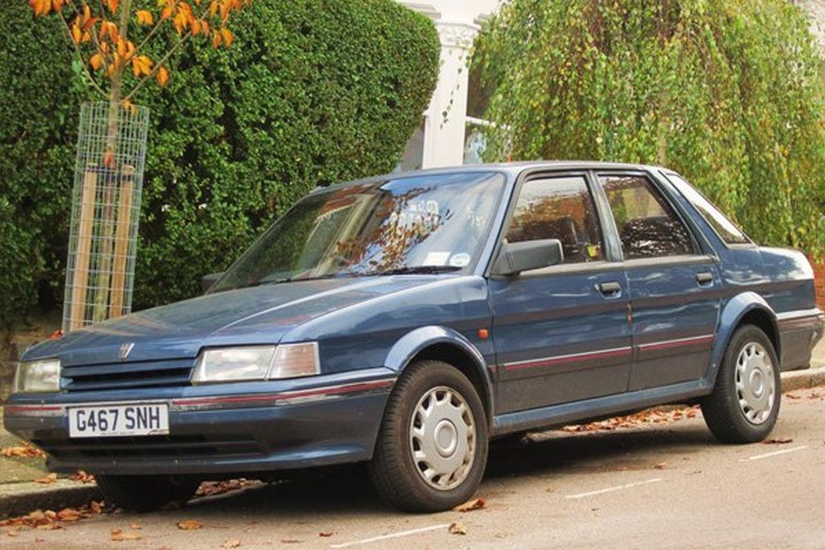 a Rover Montego next to a green wall