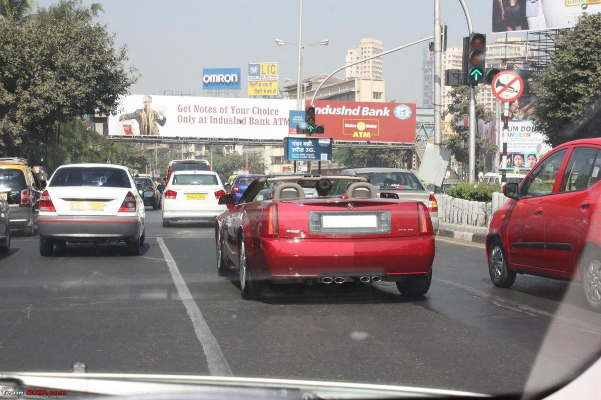 cadillac xlr of ratan tata red colour rear angle