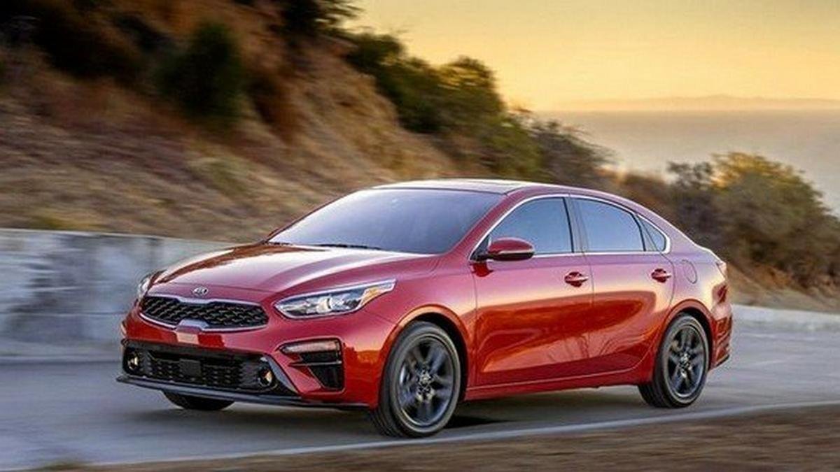 2020 Kia Rio red color running on the road