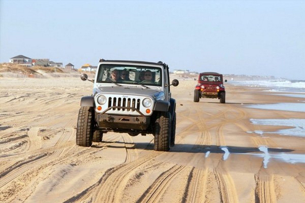 4x4 driving on sand