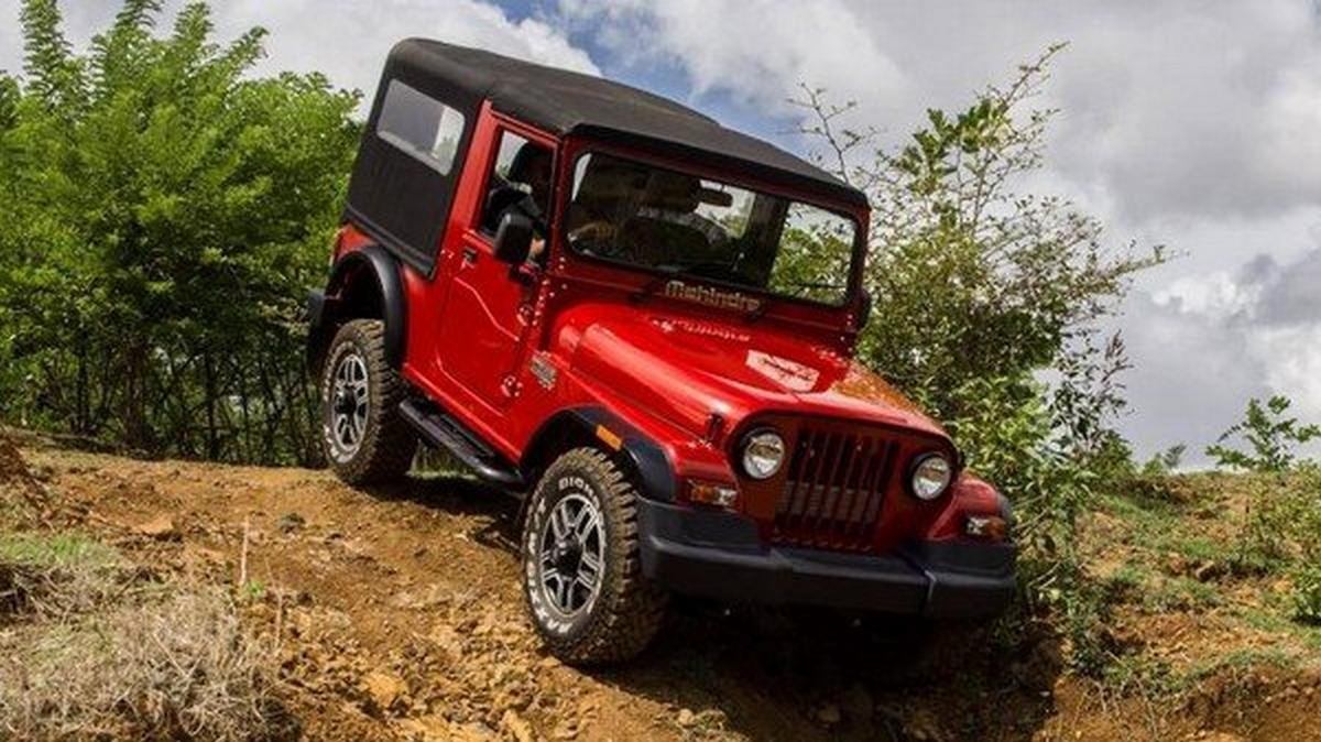 mahindra thar red colour off-roading action