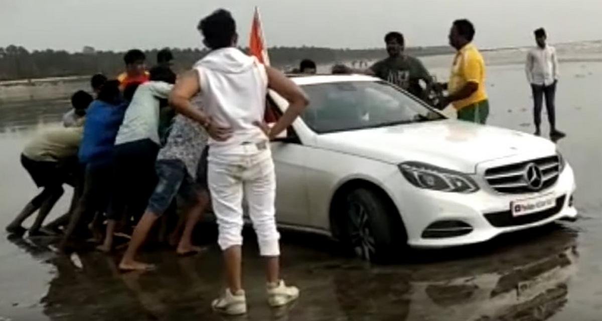 mercedes-benz e-class stuck on the beach