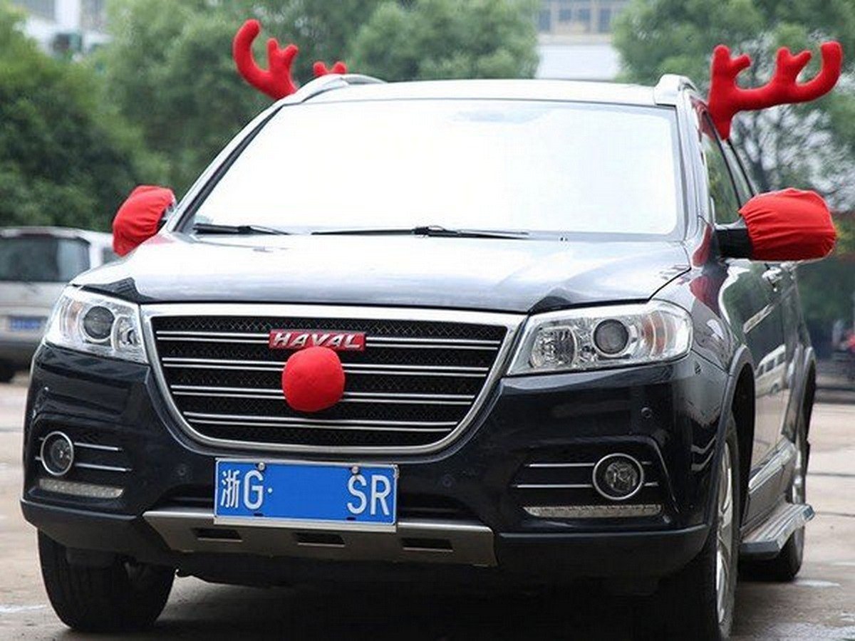 Christmas car decoration with reindeer hord