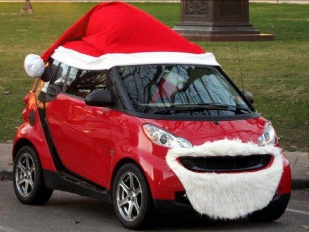 Red Hatchback car with red christmas cap