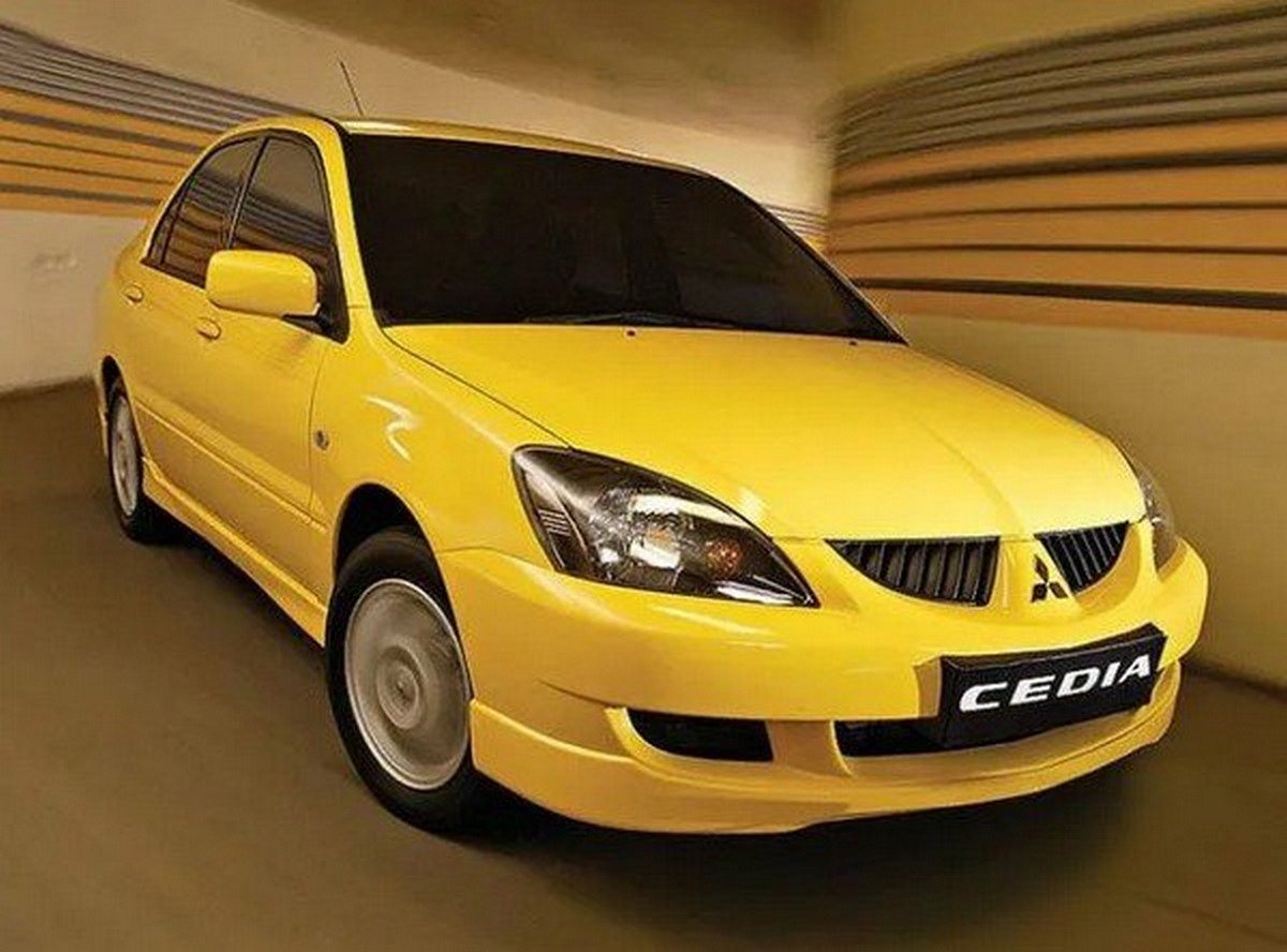 mitsubishi cedia yellow front angle