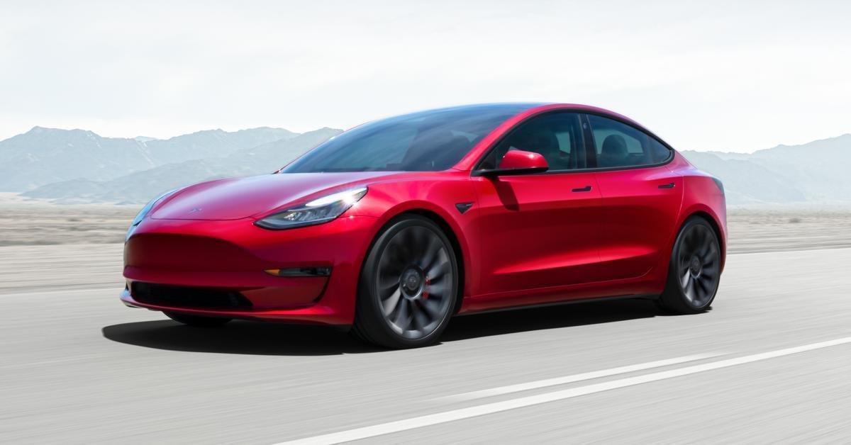Tesla model 3 red colour front three quarters