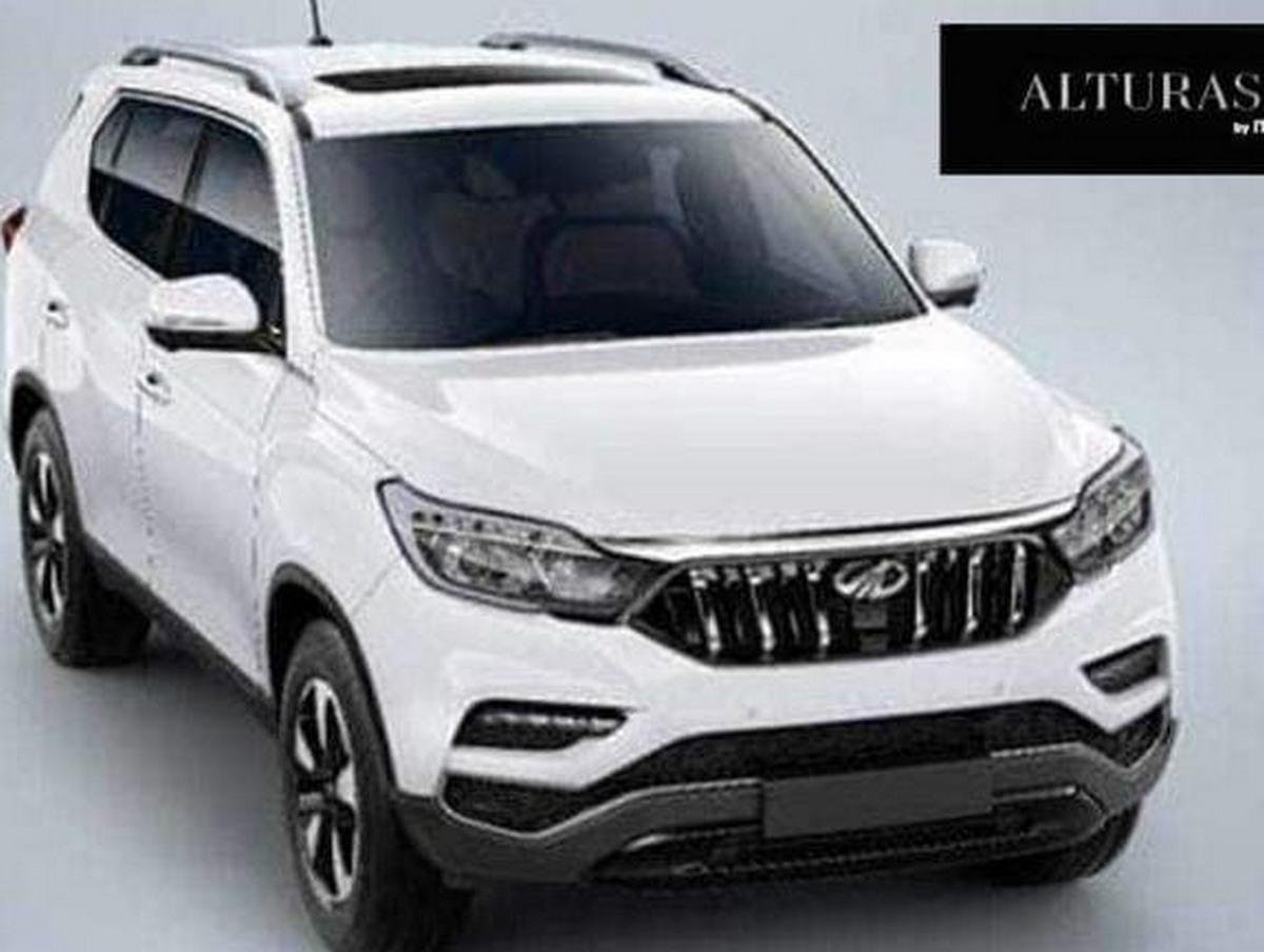 Mahindra Alturas G4 at showroom white color 