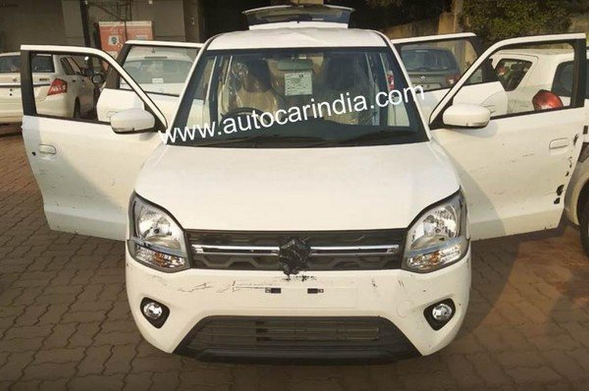 Maruti Suzuki Wagon R white color with doors open