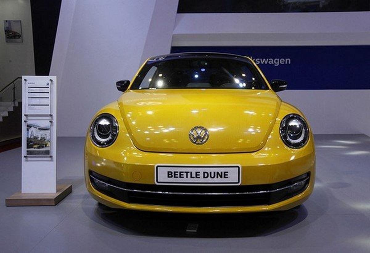 Beetle car yellow direct front look