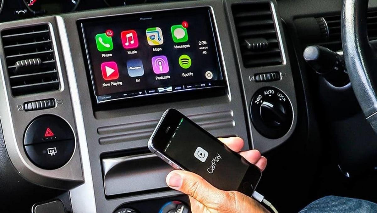 Guy in car with apple carplay