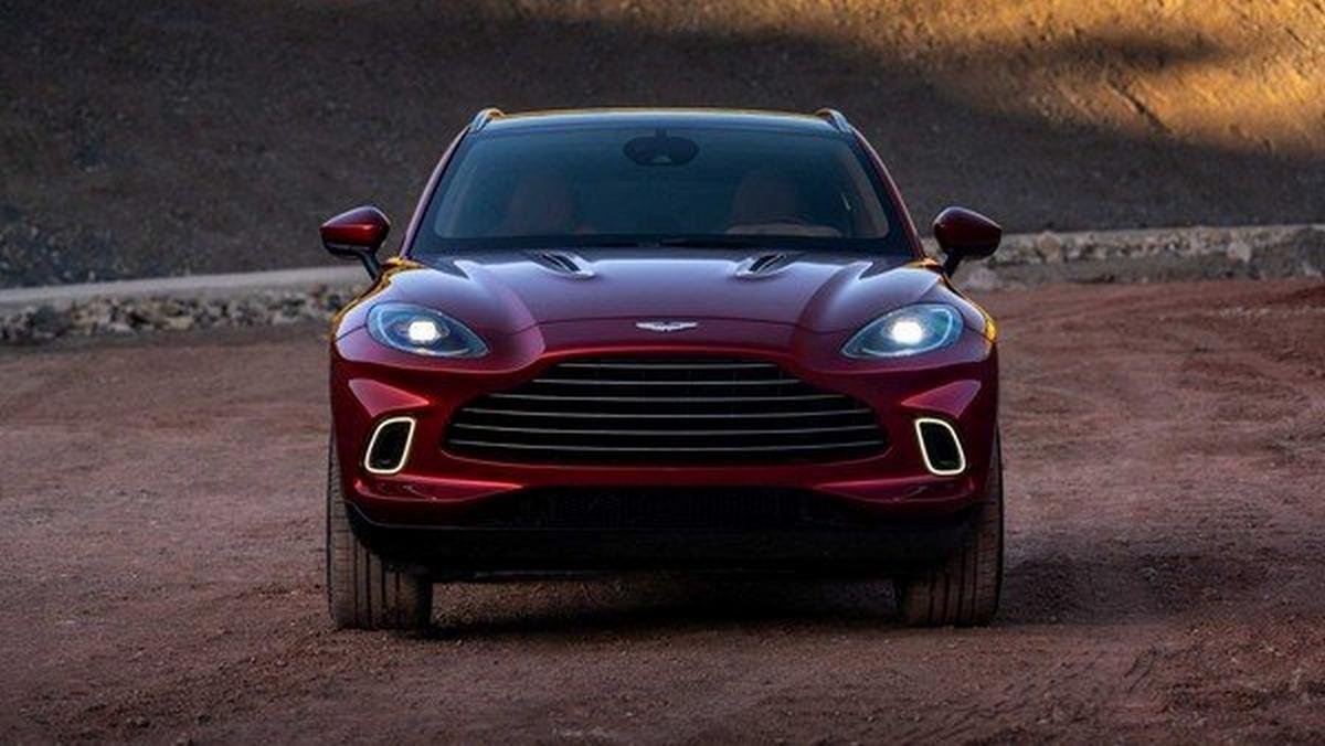aston martin dbx red colour front angle