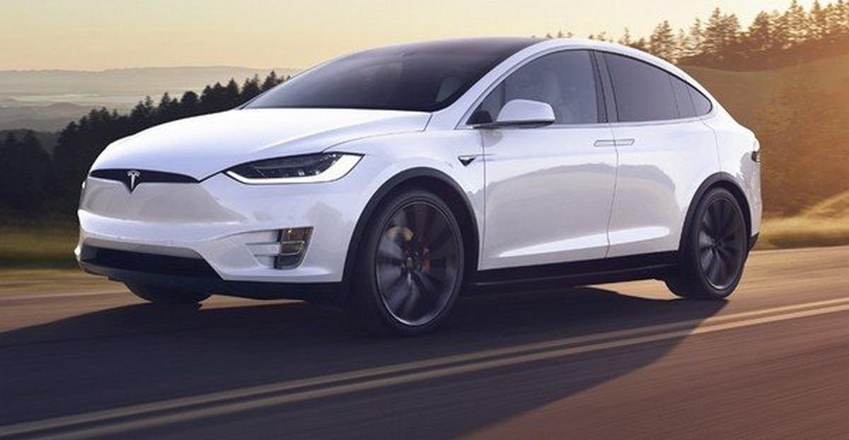 tesla model X white front three quarters