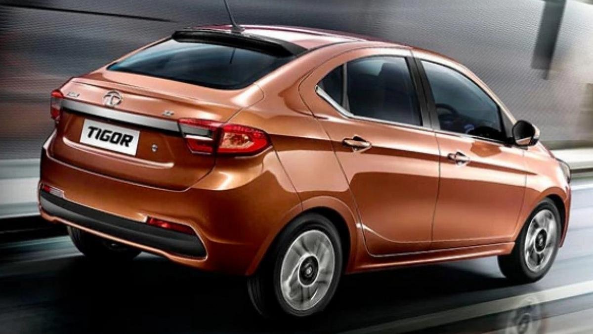 Brown Tata Tigor rear-side view