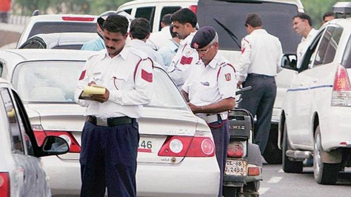 indian police stop traffic law-breakers
