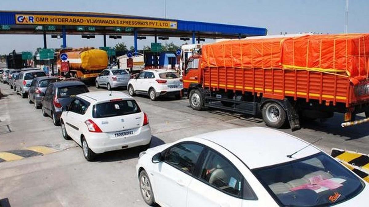 Vehicles-standing-at-toll-plaza-rear-look
