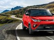 Mahindra KUV100 Exterior Front Look red color on road