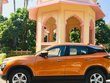 2019 Tata Harrier orange side profile parked