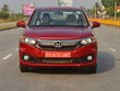 2018 Honda Amaze red front in action