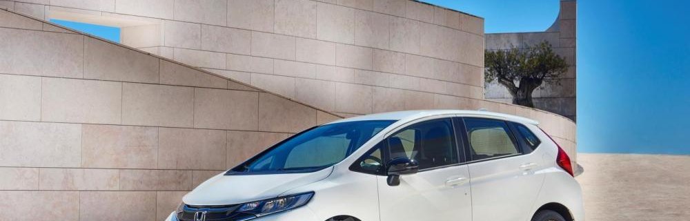 Honda Jazz 2018 white colour park on road front look
