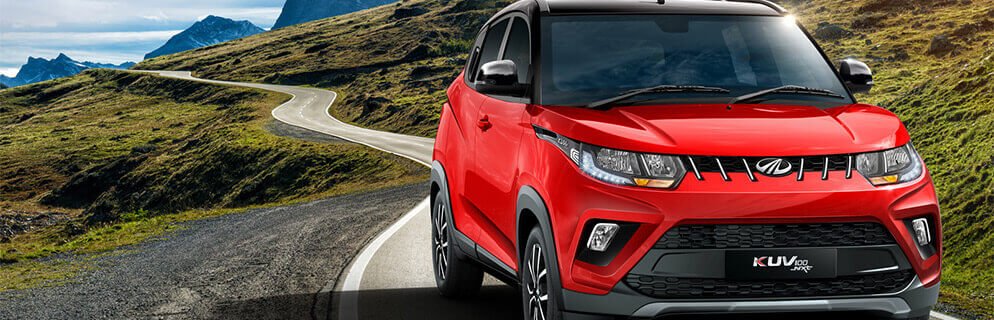 Mahindra KUV100 Exterior Front Look red color on road