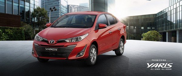 Toyota Yaris red color front look outdoor