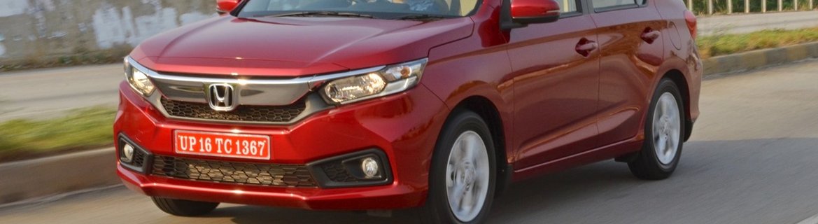 2018 Honda Amaze red front angle in action