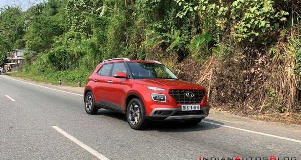 2019 hyundai venue red front three quarters right side