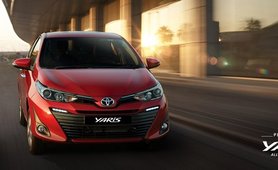 Toyota Yaris red color front look on road