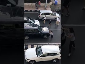 Infuriated Wife in Hyundai Creta Chases Down Husband’s Range Rover; Creates a Scene on Road