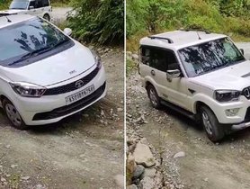 Mahindra Scorpio Struggles To Climb Uphill In Tricky Road Conditions, Tata Tiago Flies Through - VIDEO