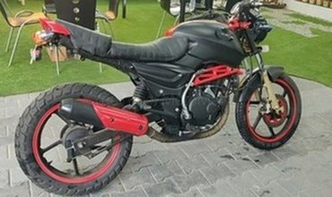 Bajaj Pulsar modified into a naked Ducati motorcycle