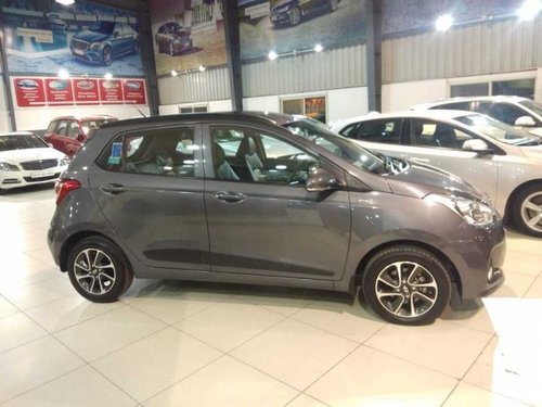 2018 Hyundai Grand i10 1.2 Kappa Sportz Option AT  in Bangalore